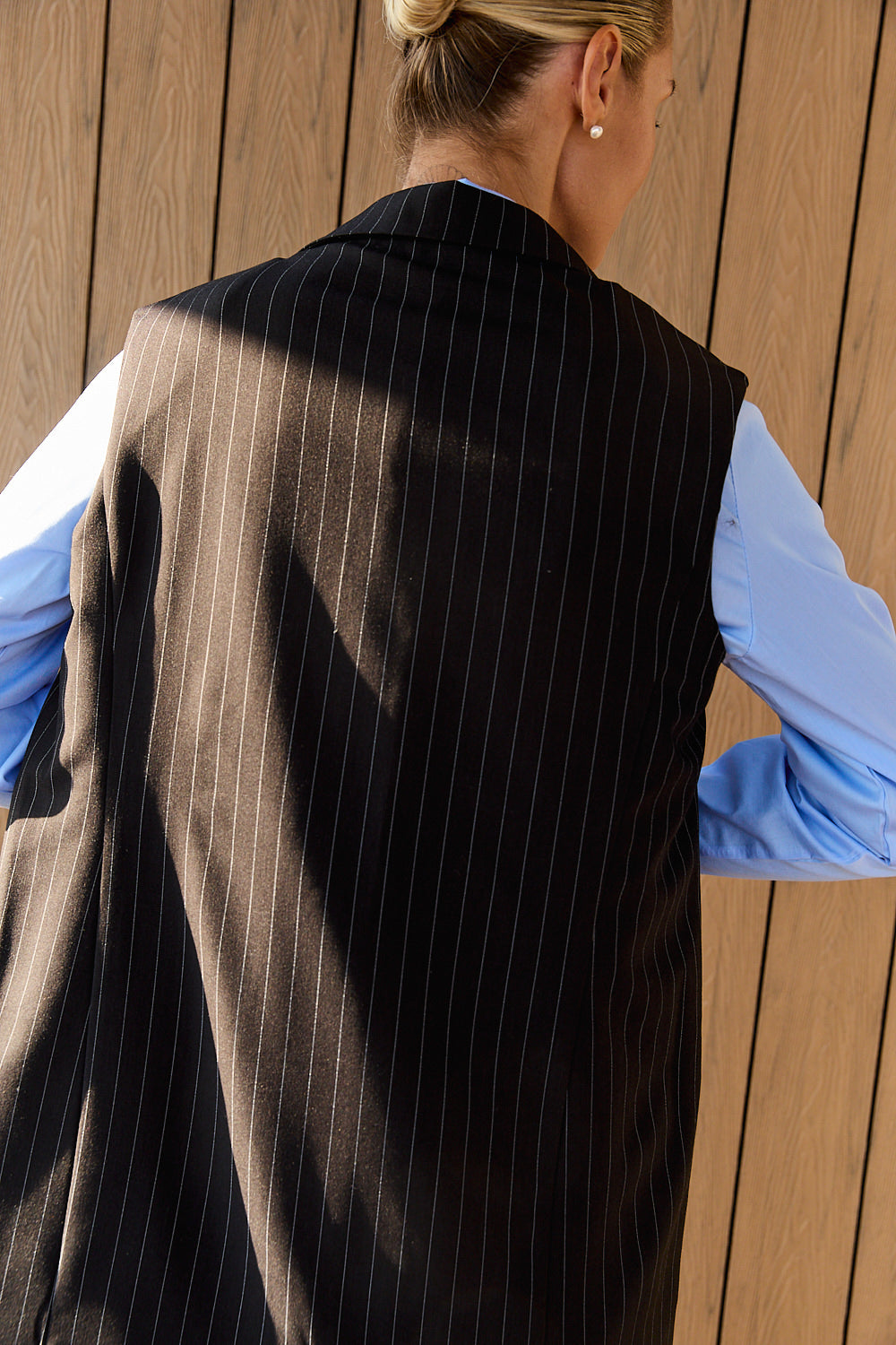 Black long vest with striped print