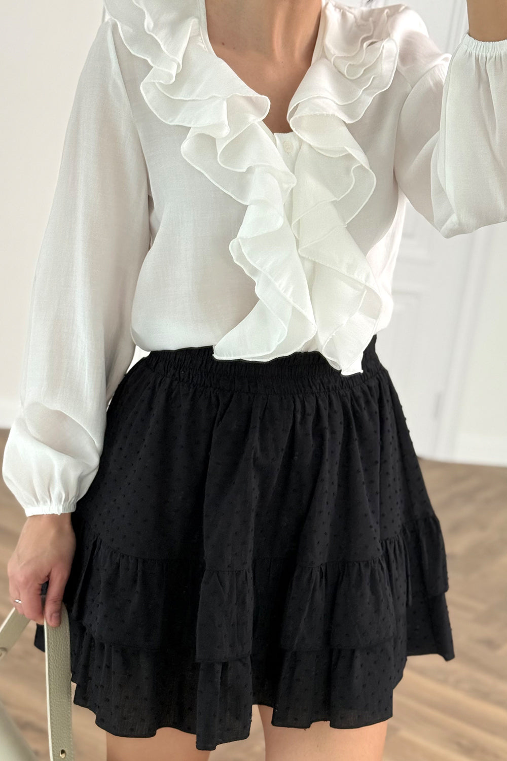 Black skirt with ruffles made of lightweight batiste