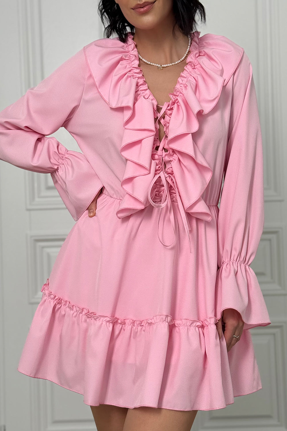 Pink light dress with ruffles