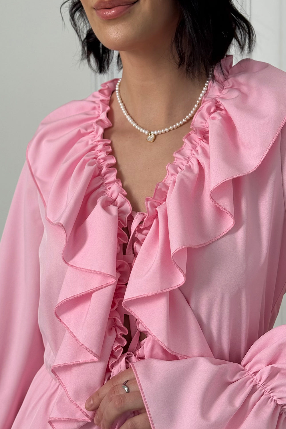 Pink light dress with ruffles