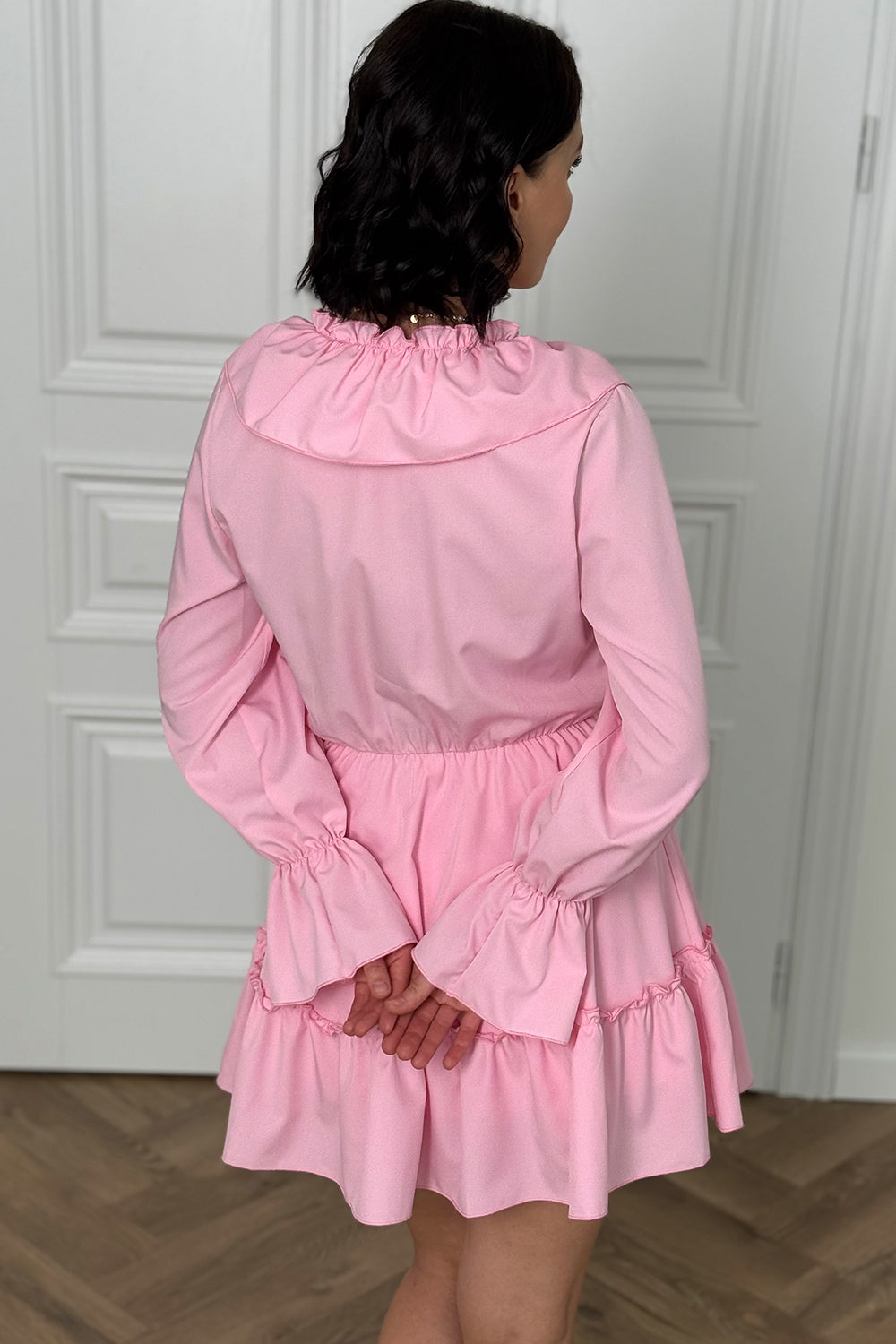 Pink light dress with ruffles