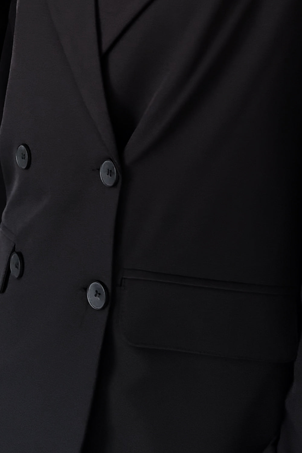 Black double-breasted jacket with a loose silhouette