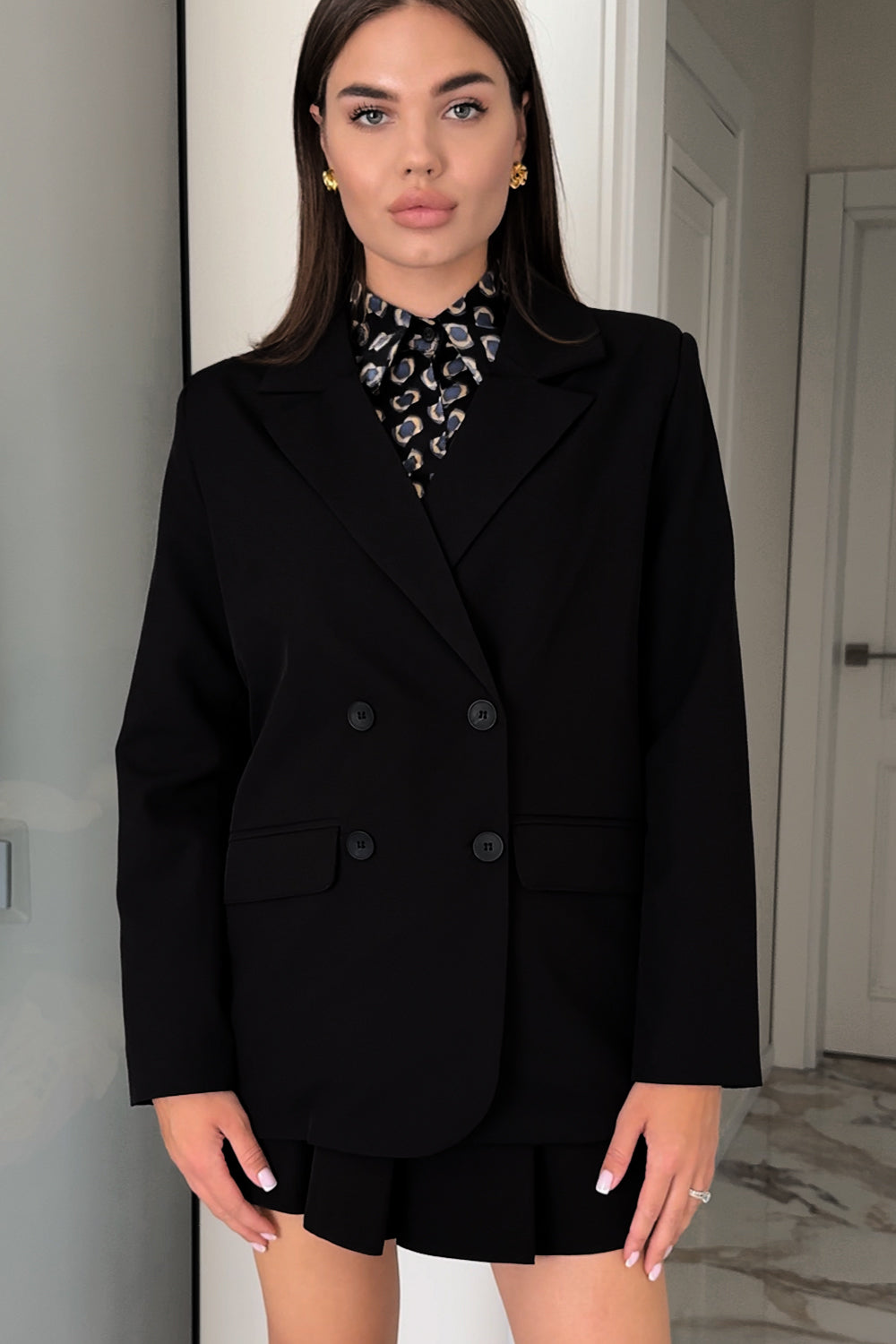 Black double-breasted jacket with a loose silhouette