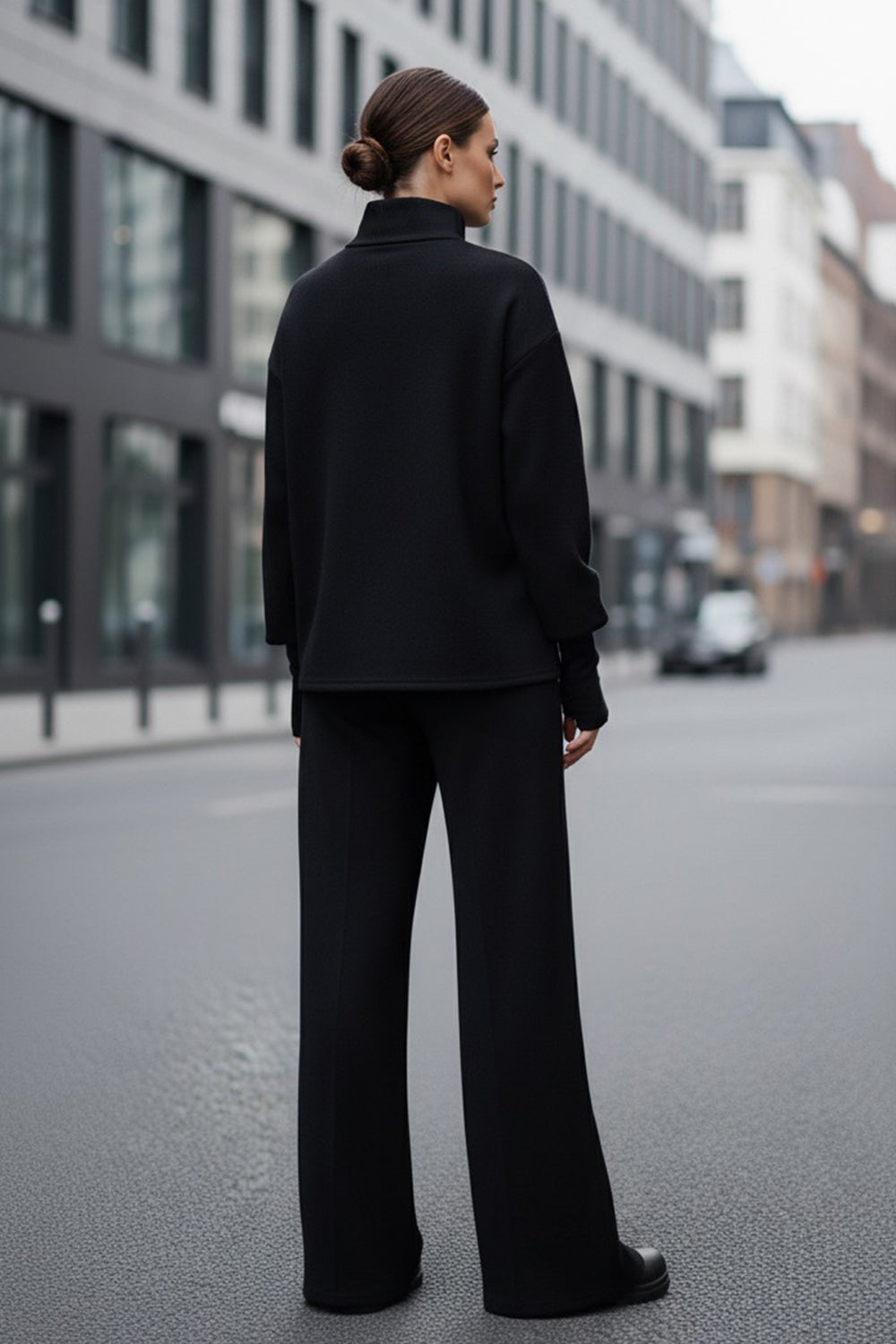 Black walking suit made of soft knitted angora