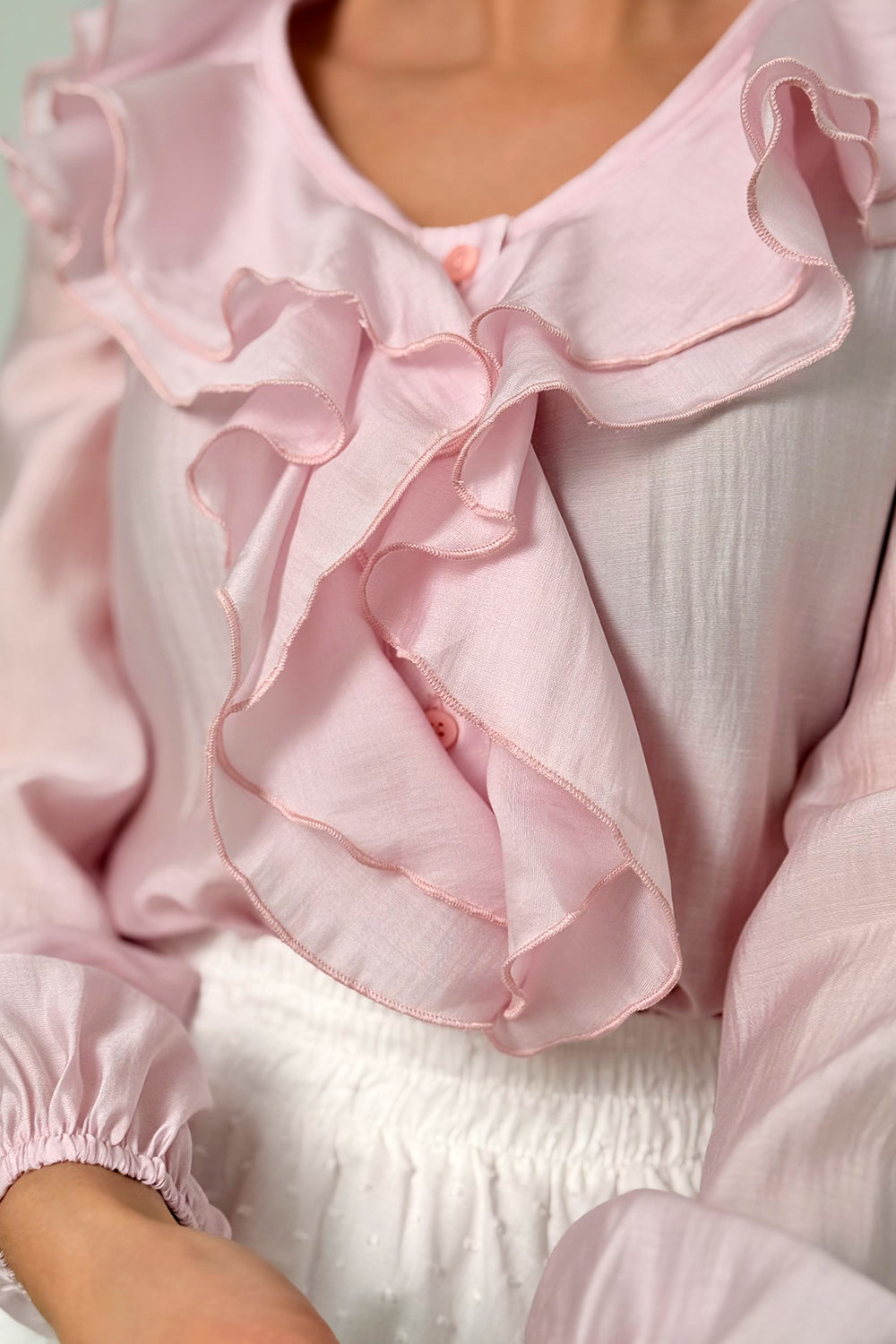 Pink blouse with double ruffles