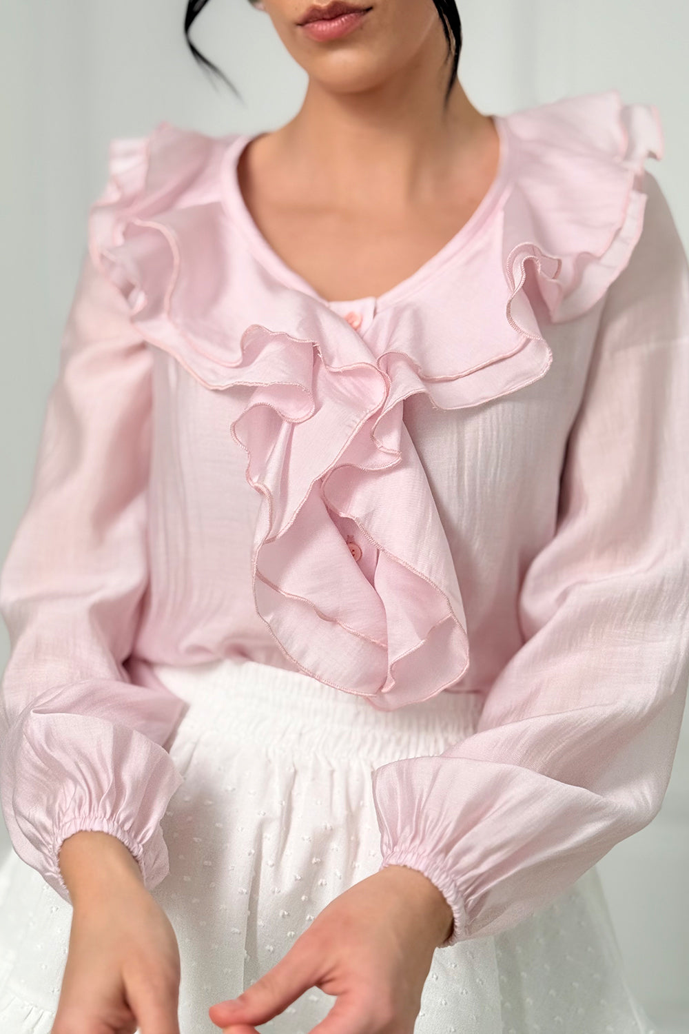 Pink blouse with double ruffles