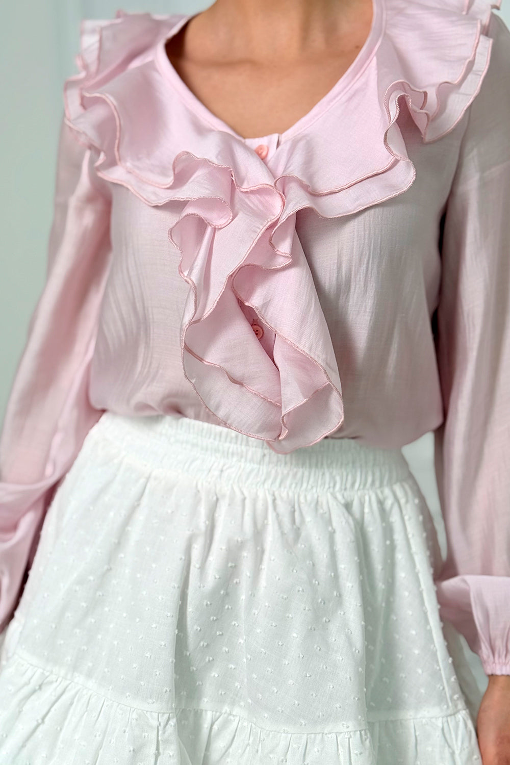 Pink blouse with double ruffles