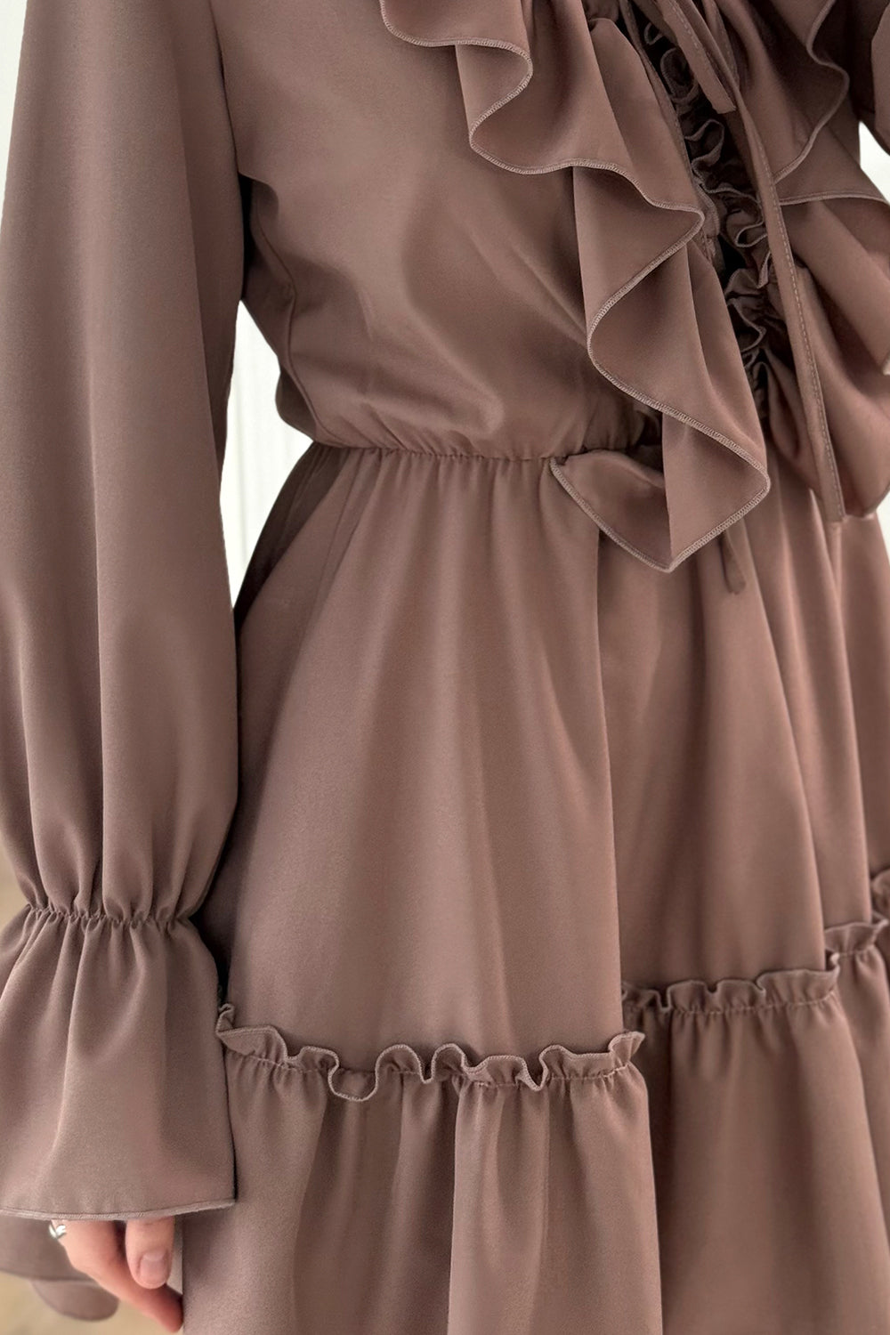 Light dress with ruffles in the color "Mocha"