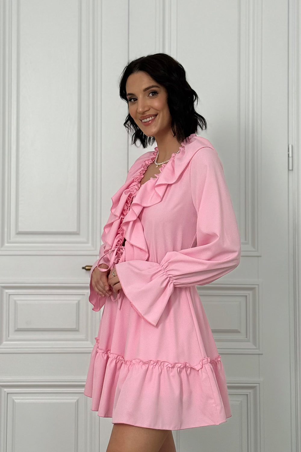 Pink light dress with ruffles