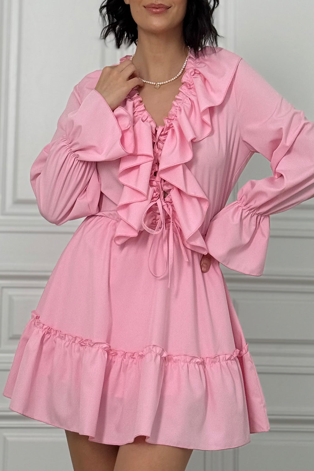 Pink light dress with ruffles