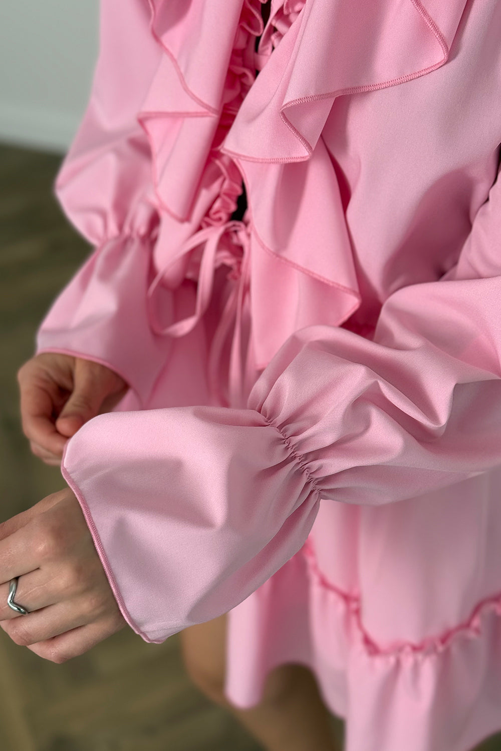 Pink light dress with ruffles