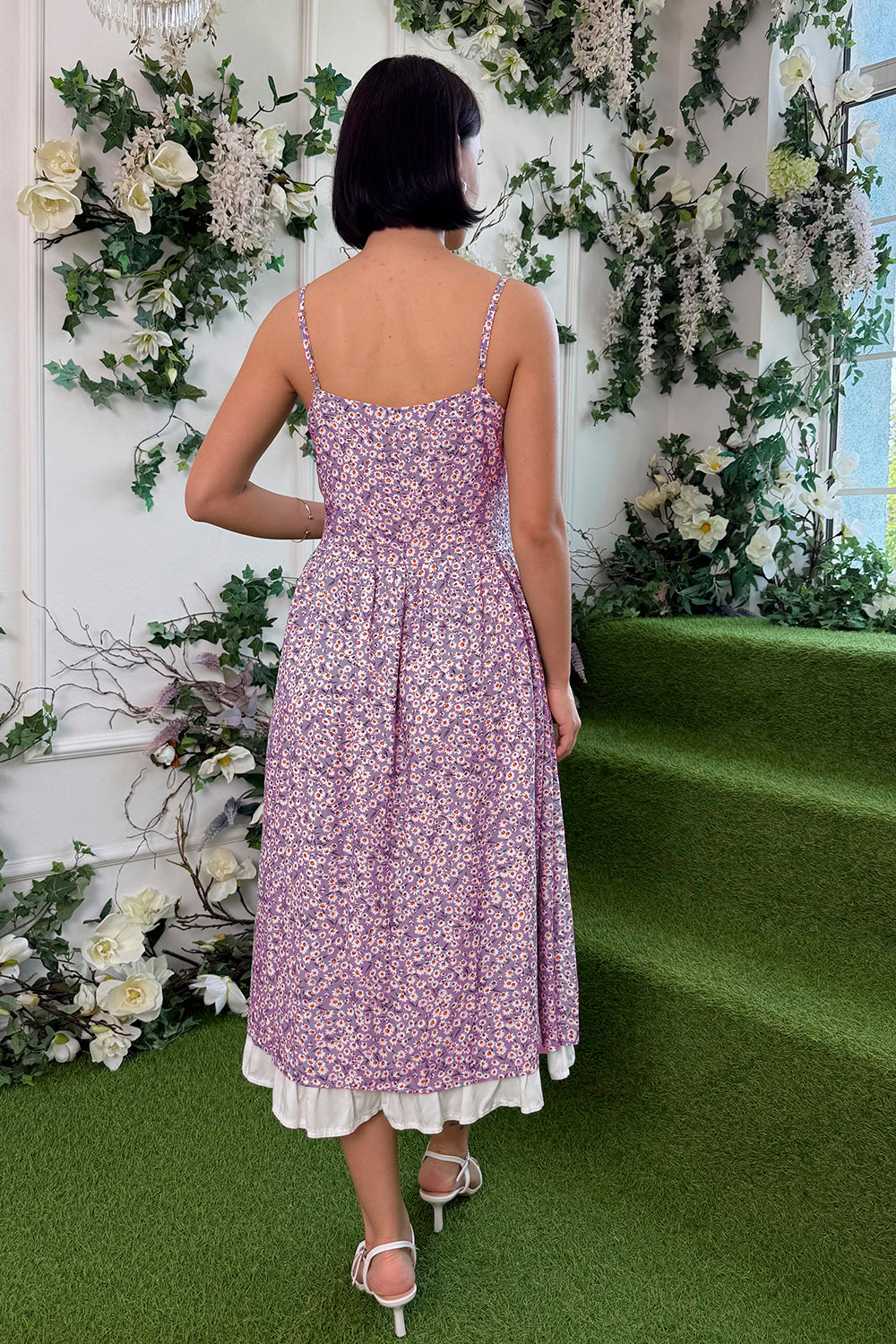 A fringed sundress with straps and a double skirt