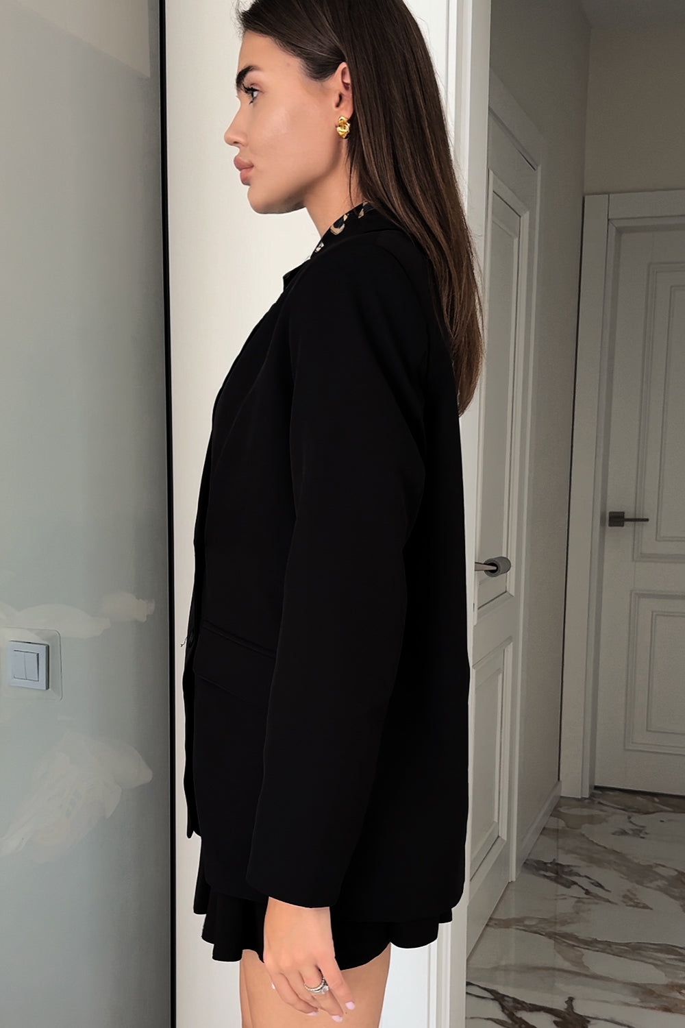 Black double-breasted jacket with a loose silhouette