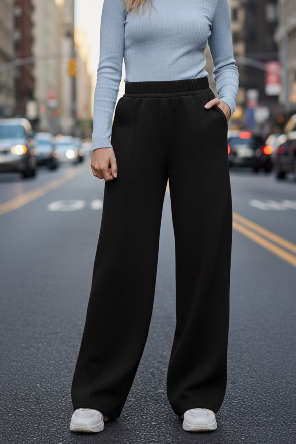 Black wide-leg knit trousers with fleece lining