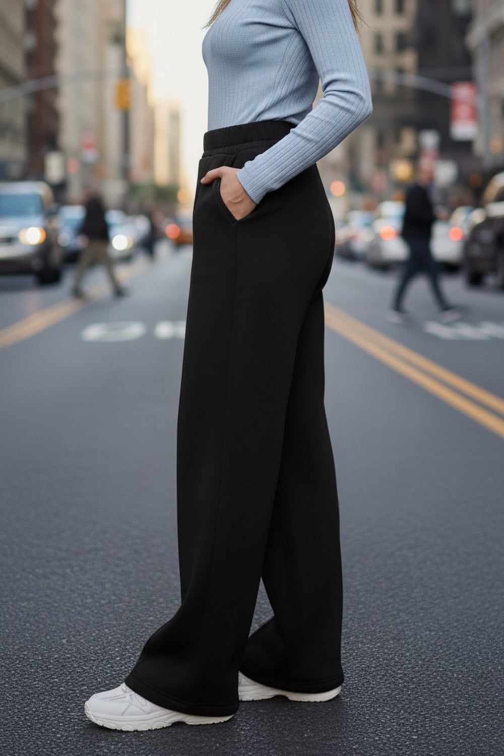Black wide-leg knit trousers with fleece lining