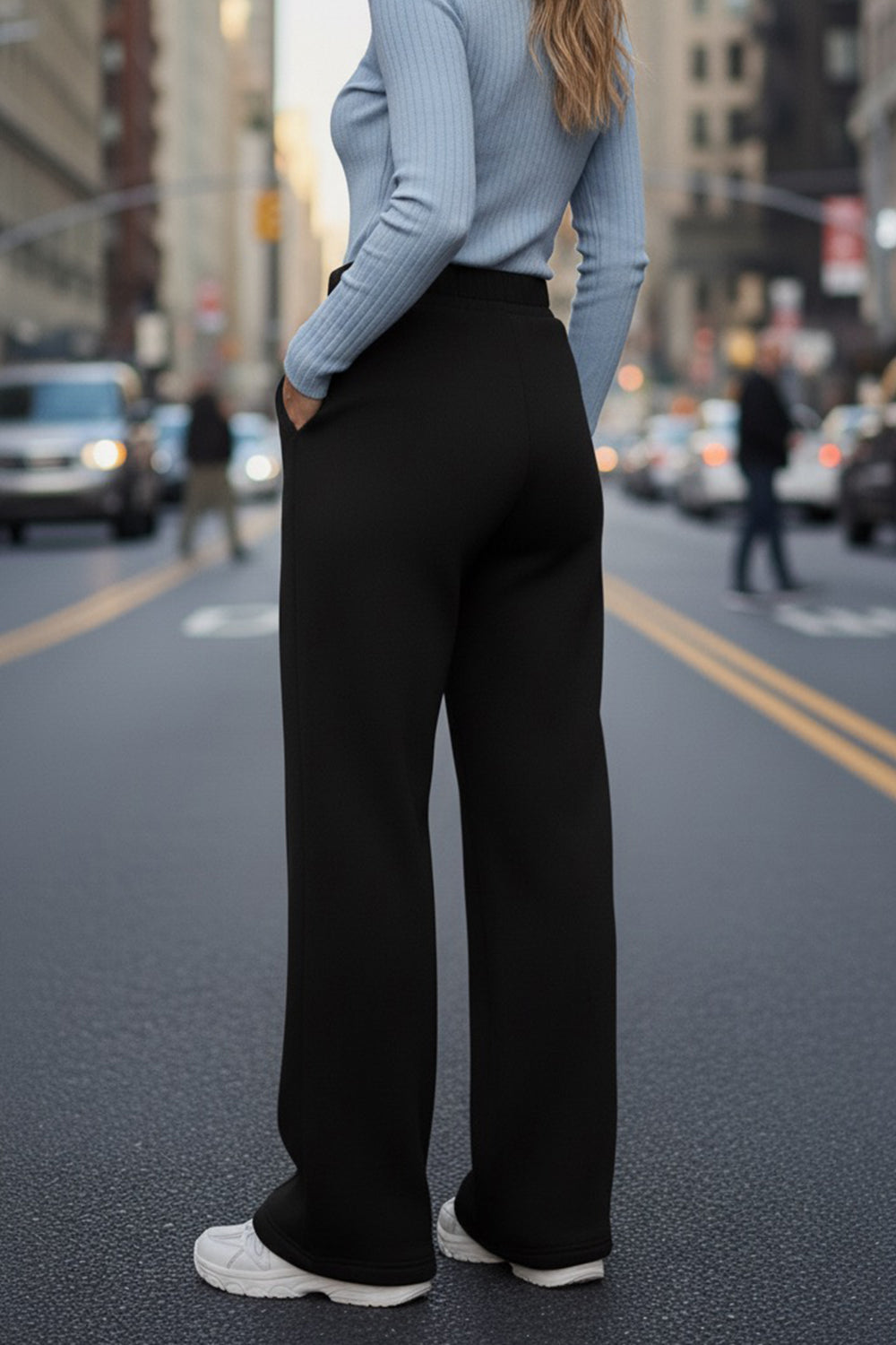 Black wide-leg knit trousers with fleece lining